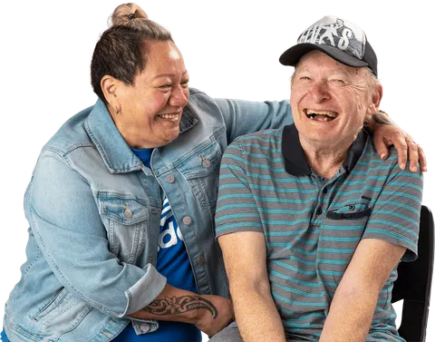 A together² support worker and an older man laughing together